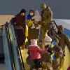 Вісім біженців повернулися із Сирії на Батьківщину