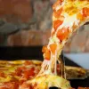 Доставка пиццы Днепр: Лучшие сыры для приготовления пиццы