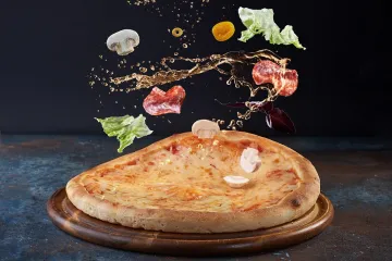​Доставка піци Дніпро: Приготування тонкої справжньої Італійської піци 